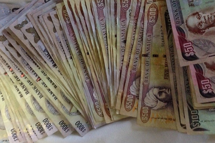 Woman Found With $2.4 Million Cash In Mobay House Raid